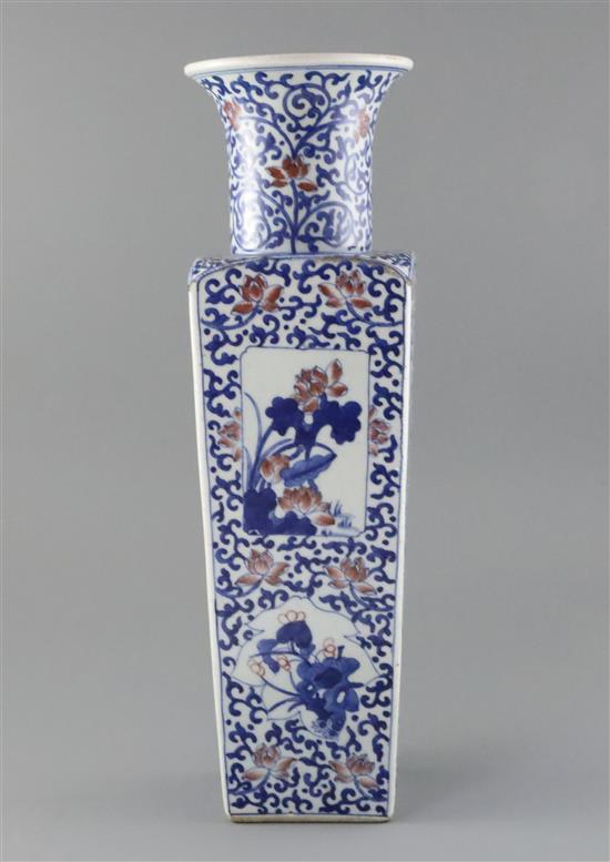 A Chinese underglaze blue and copper red square baluster vase, late Qing dynasty, H. 43.5cm